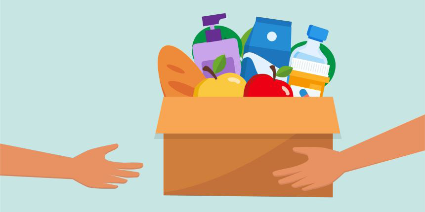 A box of food being passed from one set of arms to another